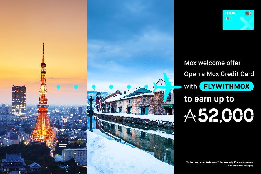 An advertisement for the Mox Credit Card featuring two contrasting travel scenes: a sunset cityscape with a brightly lit tower on the left, and a snowy canal with reflective buildings on the right. The text promotes a welcome offer: “Open a Mox Credit Card with FLYWITHMOX to earn up to A$52,000.” A financial disclaimer reads: “To borrow or not to borrow? Borrow only if you can repay! Terms and Conditions apply.”